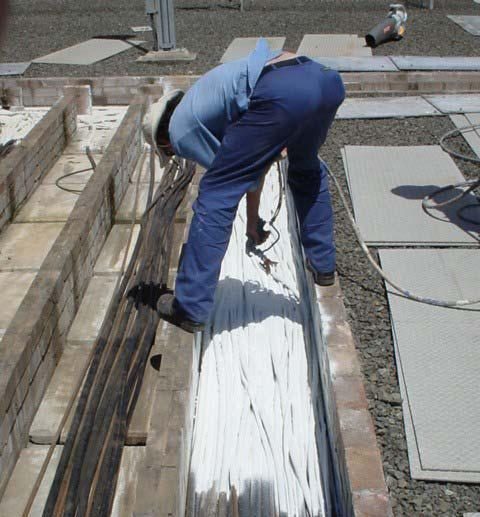 Example of fire resistant cable coating being applied on site